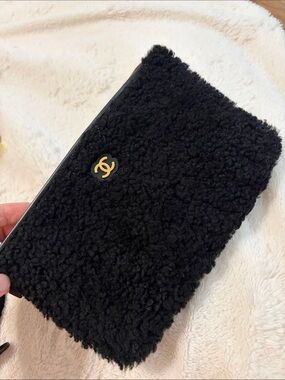CHANEL Black Shearling Phone Case with Gold CC Emblem